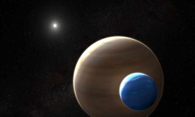 lossy-page1-640px-exomoon_kepler-1625b-i_orbiting_its_planet_artists_impression