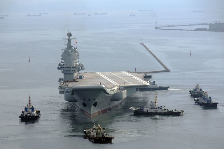 chinas-first-home-built-aircraft-carrier-towed-by-several-news-photo-1026403286-1565291375