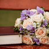 A-Bouquet-of-Flower-Next-to-a-Thick-Book-Book-is-Thus-Smelling-Good-Do-Open-and-Read-It-More-HD-Creative-Wallpaper