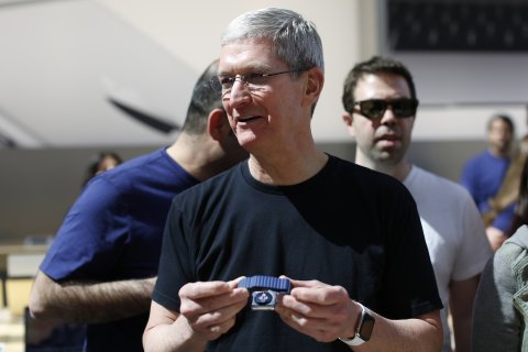 apple-ceo-tim-cook-holding-an-apple-watch