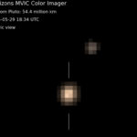 Зонд New Horizons прислал первые цветные снимки Плутона и Харона