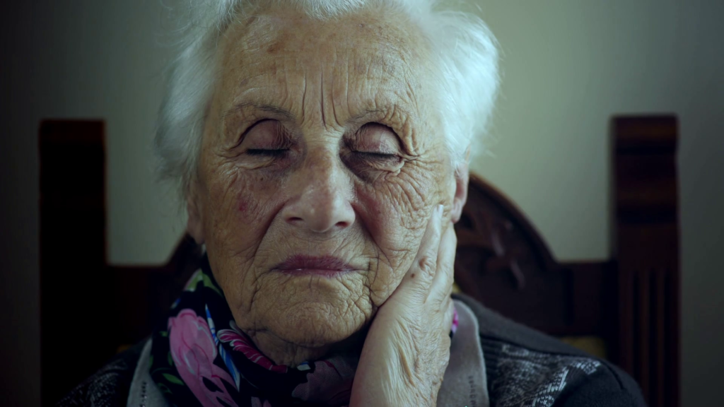 sad-old-woman-with-makeup-closing-her-eyes_sxzepqxb5l_thumbnail-full01