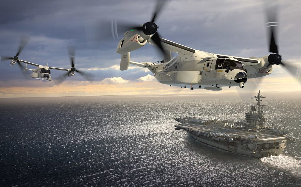 1280px-307399-03_-_artists_impression_of_a_pair_of_cmv-22bs_flying_past_uss_george_h