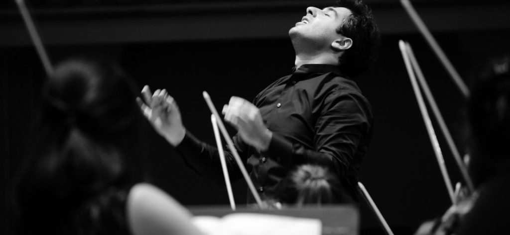 conductor-sergey-smbatyan-artistic-director-and-principal-conductor-of-the-armenian-state-symphony-orchestra-who-leads-the-concert