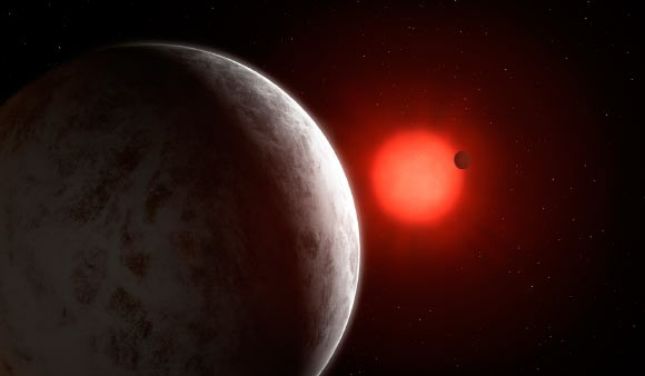 Впечатление художника от многопланетной системы сверхземель, вращающейся вокруг ближайшей красной карликовой звезды Lacaille 9352. Фото: Mark Garlick.