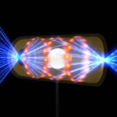 Иллюстрация эксперимента: лучи лазера проникают в хольраум с обоих концов и нагревают мишень. / © Lawrence Livermore National Laboratory через AP