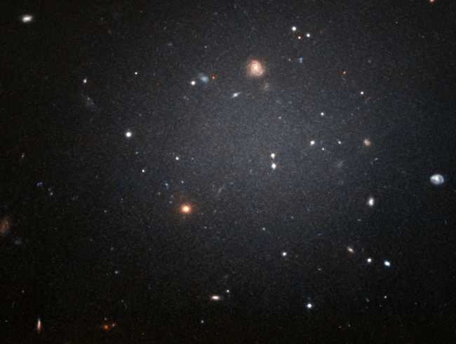Астрофизики выяснили, кто крадет темную материю у малых галактик