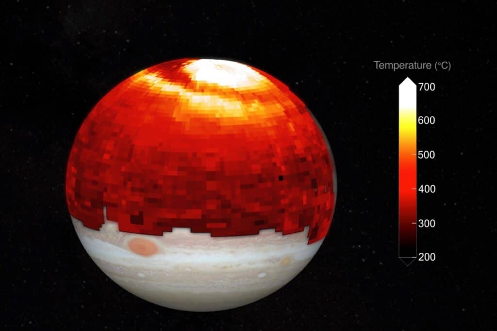 Тепловая карта северного полушария Юпитера, наложенная на оптический снимок планеты: видны раскаленная область атмосферы у полюса и волна жары, распространяющаяся к югу