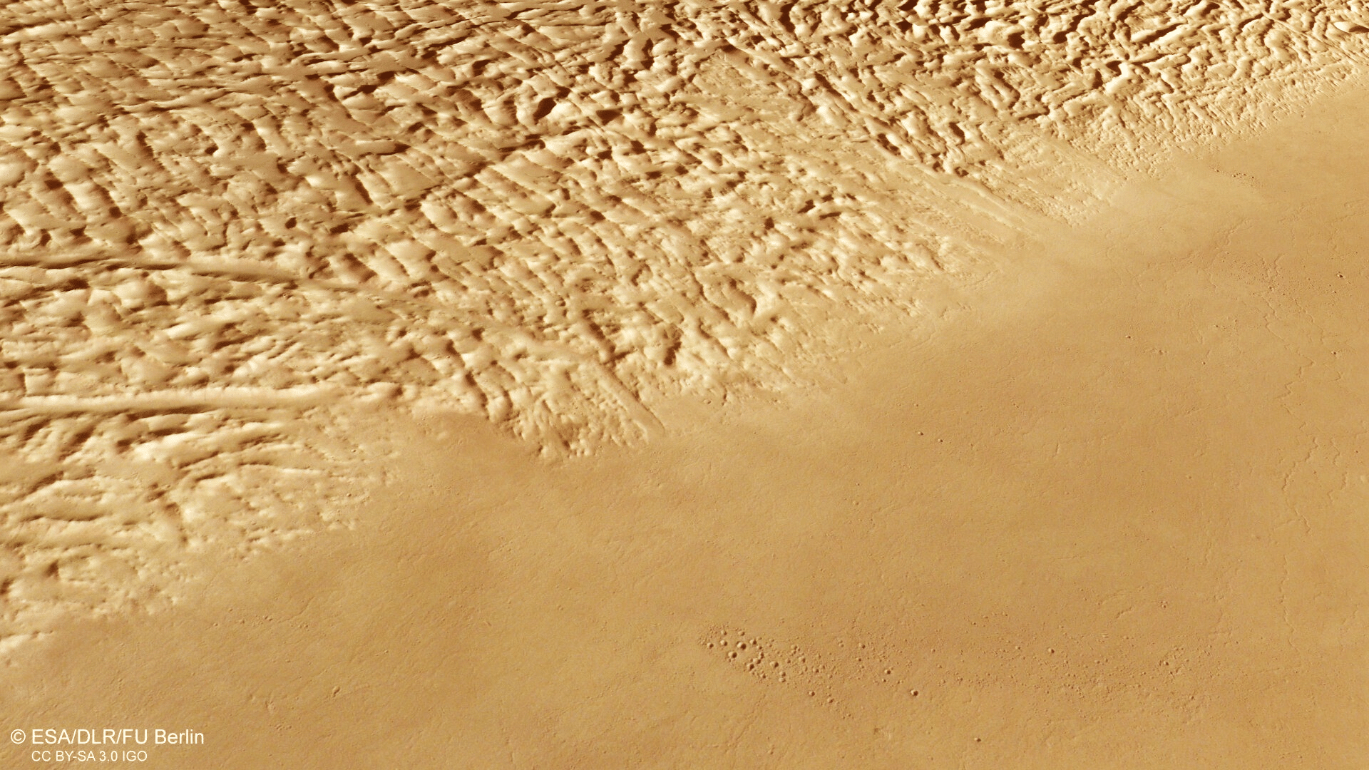 Изображение марсианского кратера Lycus Sulci сгенерировано на основе цифровой модели местности / © ESA/DLR/FU Berlin, CC BY-SA 3.0 IGO