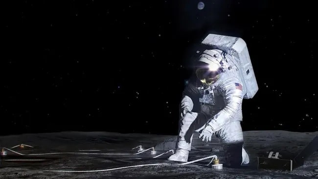 Художественная иллюстрация астронавта, размещающего приборы на поверхности Луны / © NASA