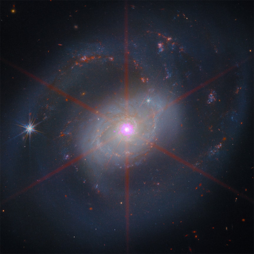 Спиральная галактика NGC 7469 / © NASA / SAO / CXC