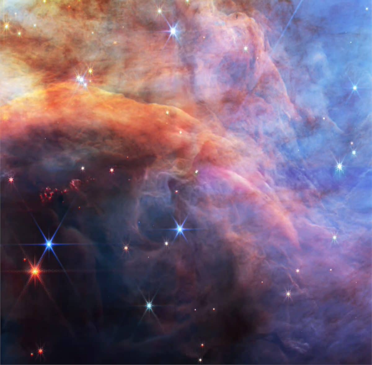 Туманность Пламя в комплексе Орионовых молекулярных облаков / © NASA / ESA / CSA / STScI